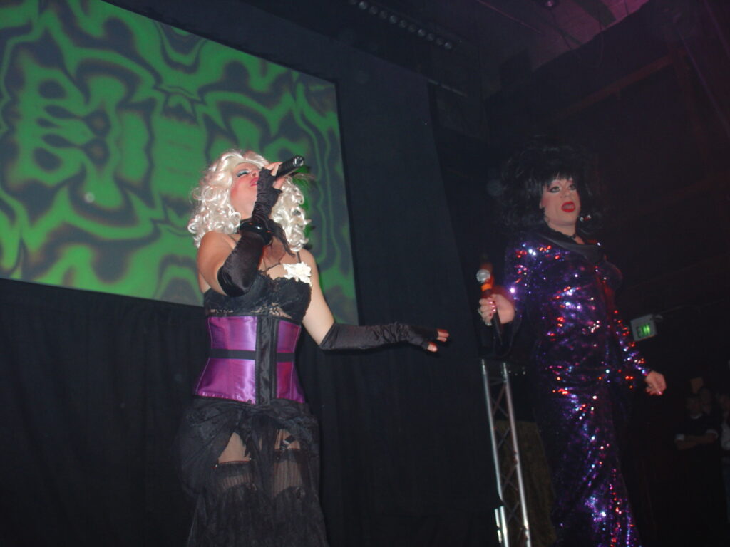 Trixxie Carr and Heklina singing the Trannyshack anthem at the Miss Trannyshack Pageant on November 18, 2006.